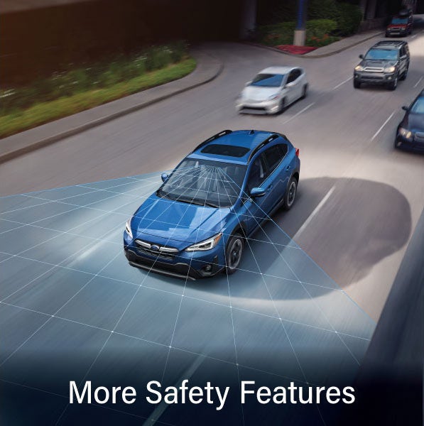 A Subaru Crosstrek in blue with the words “More Safety Features“. | Subaru of Utica in Yorkville NY